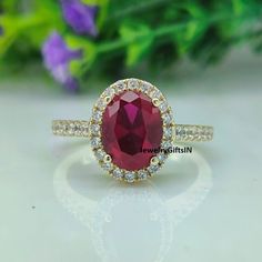 PRODUCT SPECIFICATION:  * Gemstone Type:  Lab Diamond * Color: Red * Weight:2.20 Ct * Shape : Oval * Clarity: VVS1 * Luster : Excellent  * Metal Type - 925 Sterling Silver 14K Solid Gold (White,Yellow And Rose) MOISSANITE - vs - DIAMOND * Moissanites maintain their clarity & sparkle throughout a lifetime just like a Diamond * Moissanites are actually more brilliant (sparkly) than Diamonds with a 2.65 refractive index-- Diamonds are 2.42 * Moissanite is less likely to attract grease or dirt than a diamond and should keep the 'sparkle' longer in between cleanings. * Moissanites have a hardness of 9.25 on the MOHS scale and are extremely durable. * Due to their extremely similar properties, Moissanites are often and commonly mistaken for Diamonds PACKAGING: * Each order comes carefully packag Oval Ruby Ring, Moissanite Vs Diamond, Custom Wedding Band, Anniversary Gifts For Couples, Vs Diamond, Bridal Gift, Couple Gift, Moissanite Wedding Bands, Ring Oval