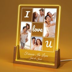 an illuminated photo frame with the words i love you