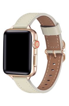 an apple watch with a white leather band