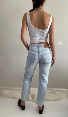 Vintage levi's 501 jeans featuring button fly and faded light stonewash patina.  soft denim.  released hem with raw edge.    waist 27.5  rise 11  hips 41  inseam 29  flat at thigh 11 at ankle 8    levi's 501 0113 tagged size 30 x 34  model is 5'10 size 2/4    sh 100 Levi Jeans Aesthetic, Levi's Classic Denim Pants, Levi’s 505, Levi 501 Jeans Women Levi's®, Levi's Vintage Medium Wash Jeans, Levis Shop, Vintage Levis Jeans 512, Vintage Levis 501, Vintage Levis Jeans