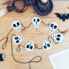 halloween decorations on a wooden table with scissors