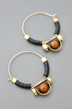 FERE24 – david aubrey Modern Black Small Hoop Jewelry, Modern Black Hoop Jewelry, Modern Small Hoop Brown Earrings, Brown Hoop Earrings With Ear Wire, Brown Small Hoop Earrings As Gift, Modern Brown Small Hoop Earrings, Bronze Metal Hoop Jewelry, Nickel-free Brown Hoop Earrings As Gift, Brown Hoop Jewelry With Ear Wire