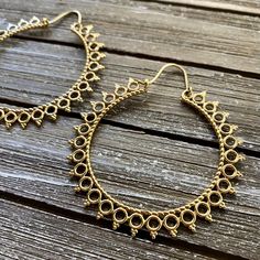 Step into the world of timeless elegance with our Handcrafted Mandala Hoop Brass Earrings - a mesmerizing blend of artistic flair and bohemian charm. Meticulously crafted in brass, these earrings feature intricate mandala designs that add a touch of spirituality and style to your ensemble. Material: High Quality Brass  Width - 2 1/4 inches (5.71cm) Length - 2.5 inches (6.35cm) LIGHTWEIGHT  🌟 **Key Features - **Artisanal Craftsmanship Each pair is meticulously handcrafted, ensuring a unique and individual touch. - **Bohemian Mandala Design Delicate hoops adorned with intricately designed mandalas, creating a harmonious balance of artistry and style. - **Versatile Statement These earrings effortlessly complement both casual and formal outfits, making them a versatile addition to your jewelr Intricate Brass Hoop Earrings, Bohemian Bronze Single Earring, Bohemian Teardrop Jewelry With Ear Wire, Nickel-free Dangle Hoop Earrings For Festive Occasions, Festive Nickel-free Dangle Hoop Earrings, Nickel-free Summer Jewelry, Bronze Bohemian Earrings With Ear Wire, Bohemian Bronze Earrings With Ear Wire, Bohemian Drop Earrings