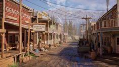 an old western town with wooden buildings and mountains in the background