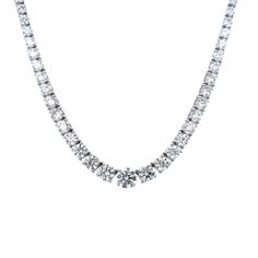 a diamond necklace on a white background with clippings to show the length and shape