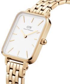 Chic Everyday Gold Watches, Chic Gold Everyday Watch, Chic Gold Watch With Rectangular Dial, Gold Minimalist Everyday Watch, Everyday Gold Minimalist Watch, Gold Minimalist Watch For Everyday, Gold Minimalist Watch For Everyday Use, Timeless Gold Watch For Everyday, Elegant Everyday Yellow Gold Watch