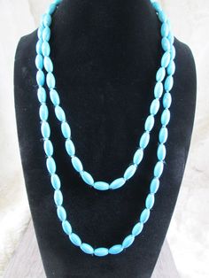 Great turquoise necklace measuring 46" long, no clasp. just slide it over your head. Can be worn long, or double it up, knot it, add more chains/ropes...make the look your own! Beautiful blue faux turquoise done in a barrel shape design. Simple, yet statement makingso versatile. LOW pricing. Turquoise Rope Necklace, How To Make Rope, Necklace Turquoise, Southwestern Jewelry, Jewelry Statement, Necklace Blue, Rope Necklace, Design Simple, Shape Design