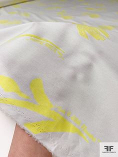 This floral printed and flocked stretch cotton lawn in yellow and off-white is a charming fabric that combines the beauty of floral patterns with a delicate flocked texture. The stretch cotton lawn provides comfort and ease of movement, making it ideal for creating feminine dresses, blouses, and skirts. Content: Cotton / Spandex Color: Yellow / Off-White Width: 57 inches Please note: due to a printing flaw that occurs throughout the fabric, this cotton has been marked down from its original pric Off White Designer, Feminine Dresses, Feminine Dress, Fashion Fabric, Floral Patterns, White Fabrics, Floral Printed, Flocking, Cotton Spandex