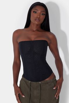 Meet our Muse Mesh Corset Top - a modern sleek black corset top with simple flattering vertical wire boning. Featuring a double layered mesh material making it slightly sheer, strapless strap top and rounded hemline. Our Muse Top provides high support to life your bust and shape your waist. Slip it on with ease by unzipping the invisible back zipper. Underbust Nylon Corset With Built-in Bra, Stretch Nylon Corset With Built-in Bra, Fitted Underwire Nylon Corset, Fitted Nylon Underwire Corset, Stretch Corset With Built-in Bra For Club, Party Nylon Bandeau Top, Party Bandeau Nylon Top, Strapless Corset With Medium Bust Support, Strapless Nylon Tops For Night Out