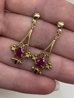 9carat yellow gold ruby drop filigree earrings  Weight: 2.6grams  Price: £295.00 Replacement price: £450.00 All articles come presented in a gift box Filigree Gold Jewellery, Classic Ruby Earrings In Yellow Gold, Ruby Earrings With Intricate Design As Gift, Yellow Gold Ruby Earrings Hallmarked, Ornate Ruby Jewelry In Yellow Gold, Formal Ruby Earrings With Intricate Design, Formal Ruby Earrings In Yellow Gold, Formal Yellow Gold Ruby Earrings, Formal Ruby Yellow Gold Earrings