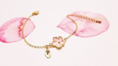 Super dainty Personalized Cherry blossom bracelet.▶▶ You can make this necklace personal choosing the quantity of letter leaf from option.Please leave a note for the desired letters in 'add your personalization'▶ Material - Gold plated over brass, Pearl▶ Chain Length - 5 ~ 9 inches (Please choose it from option)▶ charm measure - Flower H. 14mm x W. 13mm, Initial leaf ▶ The matching necklace availablehttps://www.etsy.com/listing/196300602/cherry-blossom-necklace-sakura-necklaceThe matching earrin Flower Charm Jewelry For Wedding Gift, Wedding Gift Jewelry With Flower Charm, Flower-shaped Bracelets For Bridesmaids, Pink Flower Charm Jewelry For Bridesmaid Gift, Feminine Bracelets For Valentine's Day Gift, Adjustable Charm Bracelet For Bridesmaid Gift On Mother's Day, Dainty Flower Shaped Personalized Bracelets, Handmade Bracelets For Bridesmaid Gift, Pink Jewelry For Bridesmaid Gift On Mother's Day