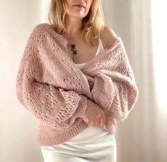 Add a touch of elegance and sophistication to your bridal ensemble with our Pink Mohair Jacket. This versatile piece can be worn in multiple ways - as a Women's Bridal Wrap, Wedding Cardigan, Mohair Cape, or Bridal Cover up. Made with high-quality mohair and wool, this Pink Cardigan is perfect for adding a pop of color to your outfit while keeping you warm and stylish on your special day. Whether you're looking for a Pink Wool Jacket for a wedding or a chic layering piece for a cool evening, thi Elegant Cream Cardigan For Wedding, Elegant Fitted Cardigan For Weddings, Elegant Winter Wedding Cardigan, Elegant Fitted Mohair Cardigan, Fitted Mohair Cozy Outerwear, Pink Wool Jacket, Mohair Jacket, Cozy Pink Mohair Outerwear, Mohair Coat