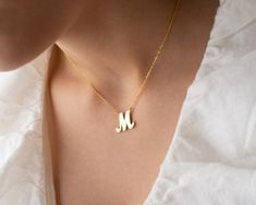 To give a dainty meaningful gift for your loved one you can prefer this 14K real gold custom letter necklace . Or this solid gold personalized initial pendant can be special treat just for yourself . You can prefer any initial on this family initial charm . This exclusive bridesmaid jewelry is made to order according . *FEATURES We are using real gold in our product for letter pendant and chain . Material : 8K Solid Gold , 14 K Solid Gold upon your request Colour : white gold , yellow gold or ro Personalized 14k Gold Initial Necklace For Mother's Day, Gold Initials Name Necklace For Mom, Gold Initials Name Necklace As Gift For Mom, Personalized Yellow Gold Initial Necklace For Mother's Day, Dainty Initial Necklace Perfect For Mom, 14k Gold Initial Necklace Gift, Gold Name Necklace With Initial Pendant For Mom, 14k Gold Initial Necklace For Gift, 14k Gold Initial Necklace As Gift