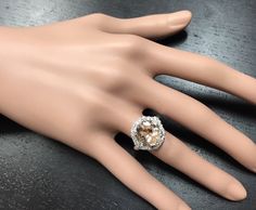 5.75 Carats Exquisite Natural Morganite and Diamond 14K Solid White Gold Ring Suggested Replacement Value: $6,500.00 Total Natural Oval Shaped Morganite Weights: Approx. 5.00 Carats Morganite Measures: Approx. 12.00 x 10.00mm Natural Round Diamonds Weight: Approx. 0.75 Carats (color G-H / Clarity SI1-SI2) Ring total weight: Approx. 5.8 grams Disclaimer: all weights, measurements and colors are approximate and may vary slightly from the listed dimensions or as seen in the image. All pictures are Formal Morganite Diamond Ring With Brilliant Cut, Luxury Gia Certified Jewelry For Evening, Formal Morganite Ring With Brilliant Cut, Formal Morganite Diamond Ring, Formal Morganite Diamond Ring Fine Jewelry, Formal Morganite Diamond Ring In Fine Jewelry Style, Exquisite Formal Morganite Ring, Formal Cushion Cut Morganite Jewelry, Formal Morganite Diamond Ring With Center Stone