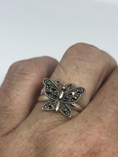 Vintage hand made Marcasite set in 925 Sterling Silver ring I have size 6.75 Can be re sized for you, my jeweler charges $10 All rings are shipped in a nice gift box. Check out our over a THOUSAND great reviews Engraving is $4 per letter and is not always perfect depending on the piece. It can take a few days if the jeweler is busy. This is payable to Paypal Judithsltd@gmail.com Vintage Adjustable Sterling Silver Butterfly Ring, Gold Sterling Silver Butterfly Ring, Vintage Sterling Silver Stackable Rings Gift, Classic Silver Butterfly Ring For Anniversary, Sterling Silver Hallmarked Butterfly Wedding Ring, Vintage Sterling Silver Butterfly Ring For Anniversary, Sterling Silver Hallmarked Butterfly Ring For Wedding, Nickel-free Sterling Silver Butterfly Ring Gift, Handmade Sterling Silver Butterfly Ring For Anniversary