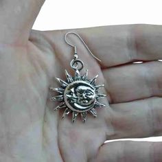 Our Sun Moon Face Earrings are a mesmerizing tribute to the timeless dance of light and shadow in the universe. They give off a sense of heavenly elegance. The sun and moon are delicately joined together in these beautiful earrings, made with great care for every detail. Sun Moon Earrings, Moon Face Earrings, Leather Charm Bracelets, The Sun And Moon, Lotus Jewelry, Dragon Earrings, Face Necklace, Moon Face, Face Earrings