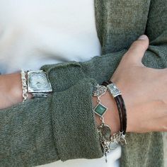 Our Tree of Life Bracelet with multi-strand leather and an enlarged birdie charm is sweet yet ruggedly casual. The unique tree charm is hand-cast in sterling silver with a bezel set CZ and then hand-brushed for a slightly oxidized finish. Perfect for those seeking a meaningful piece of jewelry. Handcrafted, 7 1/4" -8 1/2" long. Style # B392 Genuine Brown Leather Toggle Adjustable Clasp Sterling silver and CZ ".925" sterling silver quality stamp Free shipping on all orders over $100 covers USPS F Casual Silver Jewelry For Everyday Use, Silver Leather Bracelet With Lobster Clasp For Everyday, Everyday Silver Leather Bracelet With Lobster Clasp, Everyday Silver Leather Bracelet Nickel Free, Casual Silver Charms Jewelry, Casual Silver Jewelry With Charms, Everyday Silver Engraved Leather Bracelet, Everyday Engraved Silver Leather Bracelet, Tree Of Life Bracelet