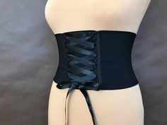 Black corset belt made of good fabric with corset binding. Enclosured with hooks. Perfect with tunics, loose blouses and dresses, for any occasion and for every day. Sizes: S 66-70 cm M 71-74 cm L 75-78 cm XL 79-82 cm If You are not sure about size, please, give me Your waist girth, I'll make perfect belt for You. Find me on Facebook :) https://www.facebook.com/sophieandherstore Elegant Corset, Black Corset Belt, Velvet Gloves, Victorian Vampire, Womens Belt, Lace Bolero, Elegant Prom, Corset Belt, Velvet Lace