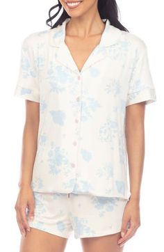 Kick back in soft, lightweight pajamas that pair a short-sleeve button-up shirt with matching drawstring-waist shorts. 24" top length; 2 1/2" inseam; 27" leg opening; 11" front rise; 14" back rise (size Medium) Top has front button closure; notched collar; short sleeves Bottoms have elastic/drawstring waist 95% rayon, 5% spandex Machine wash, dry flat Imported Short Sleeve Sleep Tops For Spring, Relaxed Fit Sleepwear With Button Closure For Pajama Party, Casual Floral Pajama Shorts For Sleepovers, Spring Short Sleeve Sleepwear For Pajama Party, Casual Collared Top For Pajama Party, Short Sleeve Tops With Button Closure For Loungewear, Relaxed Fit Short Sleeve Sleepwear For Loungewear, Summer Button-up Tops For Pajama Party, Casual Sleepwear With Button Closure And Short Sleeves