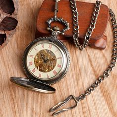 get an authentic Steampunk look with this retro pocket watch. The Retro Steampunk pocket watch has an esoteric style that the English of the Victorian era loved, with drawings of telluric lines and other hermetic symbols. Such watches were used during seances to summon spirits! Here is an accessory to play with the Victorian era and the Industrial Revolution's codes and folklore. Type: Steampunk pocket watch Movement: Mechanical hand wind Composition: Stainless steel Dial Diameter: 4.8cm Steampunk Store, Steampunk Pocket Watch, Mechanical Pocket Watch, Mechanical Hand, Fob Watch, Watch Display, Design Movements, Steampunk Clothing, Vintage Clock