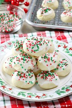 christmas sprinkle cookies are on a plate