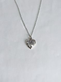 A versatile necklace featuring a sweet cherry heart charm on a non-tarnish 2mm rolo chain. The perfect addition to any jewelry collection. Our chains are 100% stainless steel and hypoallergenic so they won't rust, tarnish, or turn your neck green. - Sterling silver pendant - Will not rust or tarnish - Lobster clasp closure - Select desired size at checkout Ballet Gift, Rolo Chain, Sterling Silber, Heart Charm, Heart Necklace, Sterling Silver Pendants, Jewelry Necklace Pendant, Etsy Accessories, Jewelry Collection