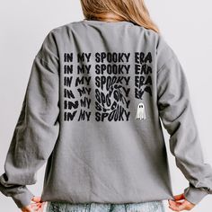 Embrace the spooky season in  our "In My Spooky Era" Sweatshirt! This trendy and cozy Comfort Colors sweatshirt features an adorable ghost printed on the front, with a swirling haunted phrase "In My Spooky Era" and the same cute ghost adorning the back. Perfect for all your autumn adventures, whether you're carving pumpkins, enjoying a haunted hayride, or just cozying up by the fire with a good scary movie. This sweatshirt is a must-have for anyone who loves to celebrate Halloween in a fun and fashionable way. It's the ultimate blend of comfort and festive spirit, making it your go-to piece for the entire spooky season! This custom crewneck sweatshirt brings both incredible quality and amazing style to the mix. Made with soft, ring-spun cotton fabric with 100% cotton threads, it sits unmat Spooky Long Sleeve T-shirt For Winter, Horror Long Sleeve T-shirt For Fall, Fall Horror Crew Neck Sweatshirt, Horror Crew Neck Sweatshirt For Fall, Horror Style Crew Neck Sweatshirt For Fall, Spooky Long Sleeve T-shirt With Screen Print, Spooky Long Sleeve Screen Print T-shirt, Spooky Long Sleeve T-shirt For Fall, Horror Long Sleeve T-shirt With Letter Print