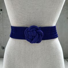 80s royal blue elastic belt, vintage stretchy waist wear, blue flower buckle, fabric sash, summer spring fashion statement, boho hippie look Embrace the nostalgic allure of the 80s with our Vintage Royal Blue Elastic Belt--an iconic piece that transcends time. This stretchy waist wear, reminiscent of an era defined by bold self-expression, is adorned with a captivating blue flower buckle, infusing a touch of whimsical charm. Crafted for comfort and style, the elastic belt effortlessly complements your silhouette, making it a versatile addition to your summer and spring wardrobe. The fabric sash, generously draped, adds an element of boho hippie flair, creating a fashion statement that resonates with carefree elegance. Whether cinching a flowing summer dress or enhancing the laid-back vibes Blue Fringe Belt, Belt Collection, Hippie Accessories, Purple Belt, Fabric Rose, Tie Dye Fabric, Hippie Look, Blue Belt, Fabric Roses