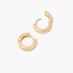 Available in 14k gold vermeil Hoop size: 1/2" Hoop width: 1/8" Hinged closure SKU: BYE1124 Classic Gold-tone Huggie Earrings, Classic Gold-tone Huggie Jewelry, Tarnish Resistant Brass Huggie Earrings, Gold-tone Pierced Huggie Earrings Gift, Everyday Gold-tone Polished Earrings, Nickel-free Yellow Gold Huggie Earrings, Gold-plated Huggie Earrings With Polished Finish, Classic Gold-plated Yellow Gold Cartilage Earrings, Gold-tone Classic Huggie Earrings For Everyday