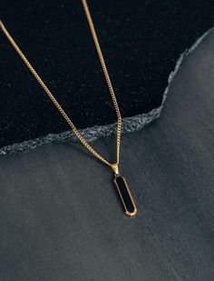 Be stylish, bold, and confident with this stainless steel drop pendant necklace. It is both masculine and durable and will maintain its sleek appearance for a long time when handled with care, it is perfect for everyday wear and is safe for your sensitive skin. 💎Free shipping on all orders💎Packaging that is ready to offer as a gift💎Customizable chain length The black drop pendant necklace, a perfect gift or stylish piece for yourself Indulge your loved ones with this timeless and elegant drop pendant necklace, designed to add a touch of sophistication to any man or woman's wardrobe. A perfect gift for those who appreciate classic and bold style! A stylish, durable and timeless pendant necklace Because it is made of stainless steel, it is going to last over the years and it is designed f Mens Sapphire Necklace, Gold Chain On Men, Male Necklace Pendants, Gold Chains For Men With Pendant, Cool Mens Necklace, Men Simple Jewelry, Men Necklace Pendant, Modern Black Necklaces For Everyday Use, Modern Black Necklace For Everyday Use