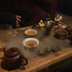 a table with tea and other items on it