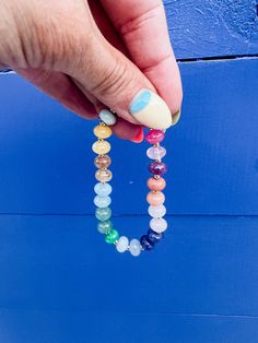 Unleash your colorful side with this playful stack of pink and multi-colored beaded bracelets. Fun and stylish, this rainbow bracelet adds a pop of color to any outfit. Get ready for a colorful adventure! Product Details: multi colored gemstone beads handmade stretchy Nickel And Suede, Rainbow Bracelet, Beads Handmade, Top Collection, Gemstone Colors, Multi Colored, Gemstone Beads, Outfit Sets, Accessories Hats