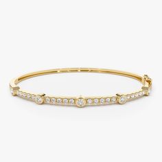 Elevate your wrist's elegance with our 14K Diamond Station Bangle, a stunning round diamond bracelet bangle featuring a gold hinge design. This diamond bangle bracelet exudes sophistication and charm, making it a beautiful accessory for women to adorn their wrists with timeless beauty and style. ▶Item Details * Made to Order * Gold KT: 14K Solid Gold (also available in 18K  upon request) * Custom Gold Color: Rose Gold, Yellow Gold, White Gold * Round Diamonds: 5pcs x 1.90MM * Round Diamonds: 20 pcs x 2.30MM * Total CTW: 0.76CTW * Diamond Color Clarity: G Color SI Clarity * Ready to Ship in 7-10 Business Days ▶ See more of our Diamond Bracelets - http://etsy.me/2mVrAB5 ▶ See our storefront here - http://etsy.me/2lUcVnH  ▶ All store sections here * Diamond Rings - http://etsy.me/2lwKUl8 * Di Classic Hand Set Yellow Gold Bangle, Classic Gold Bangle Bracelet With Diamond Accents, Timeless Round Cuff Bracelet With Single Cut Diamonds, Classic Single Cut Diamond Cuff Bangle Bracelet, Classic Single Cut Diamond Cuff Bangle, Classic Round Bangle With Diamond Accents, Classic Hand-set 14k Gold Bangle, Elegant Cuff Bracelet With Brilliant Cut, Classic 14k Gold Hand Set Bangle