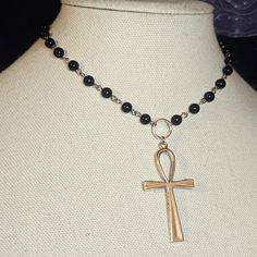 Large Ankh Cross Pendant Choker Necklace. Made With Black Glass Beads & Finished With Chain In The Back. Measures Approximately 14 Inches. Has A Lobster Clasp And 1.5 Inch Extension Chain. #Rosary #Choker #Cross #Goth #Grunge Silver Cross Jewelry With Black Beads, Handmade Metal Ankh Necklace, Black Ankh Jewelry For Gifts, Black Ankh Metal Jewelry, Black Metal Necklaces With Silver Beads, Black Metal Necklace With Silver Beads, Nickel-free Black Beaded Necklace As Gift, Nickel-free Black Beaded Necklace Gift, Nickel-free Black Beaded Necklace