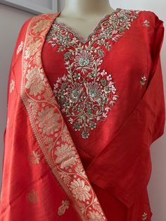 This is a beautiful 3 piece Kurta Set in Chinnon Silk  . The Kurta is lined with embroidered neckline and butti work all over the front . Dupatta for this is in Banarsi Silk with motifs all over. This is perfect addition to any special occasion or festival . Perfect for Diwali , Eid , Rakhi , Holi, Karwa Chauth, Navratri Celebrations !! Chanderi Palazzo Set With Traditional Drape For Diwali, Diwali Slub Silk Kurta With Dabka Work, Bollywood Style Slub Silk Salwar Kameez With Pallu, Unstitched Slub Silk Suit With Gota Work, Festive Slub Silk Sharara With Straight Kurta, Transitional Art Silk Palazzo Set With Dupatta, Transitional Slub Silk Salwar Kameez With Dupatta, Navratri Slub Silk Palazzo Set With Dupatta, Semi-stitched Slub Silk Kurta With Dupatta