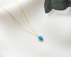 This dainty blue opal necklace ( gold oval opal necklace) is perfect birthday gift a woman. Also, this personalised opal necklace would be a great mother, new mom, daughter, bridesmaid, bride, bridal shower, baby shower, anniversary, grandma, teenage girl, graduation, girlfriend, best friend, engagement, baptism, wedding gift or a treat for you! This minimalist jewellery has been produced with high quality 925k solid silver and available in silver, gold and rose gold colour. You can choose dark blue opal or light blue opal, chain length and colour and you can make your unique jewellery. * great for daily wear * hypoallergenic * nickel-free, lead-free & cadmium-free * chain in different lengths * handmade in the UK * arrives in gift box * can include your gift message (leave in Note to Sell Best Friend Engagement, Daughter Bridesmaid, Simple Pearl Pendant, Opal Necklace Gold, Girl Graduation, Rose Gold Colour, Family Birthstone Necklace, Great Mother, Blue Opal Necklace