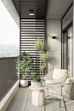 a balcony with two chairs and potted plants on the side walk, next to a large window