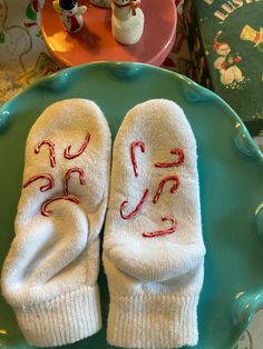 "Jumbled Candy Canes.  Perfect for opening Christmas Eve, or Christmas morning - keep your toesies cozy while presents are being opened!  Multiple variations are available - See my other listings. READY TO SHIP! Just let me know what name you would like painted on the toe of the sock. Socks with a personality. The designs on these socks make them no-slip.  PLEASE NOTE: This means the design on the sock is painted on the bottom! CARE INFO: I use only better socks known for their durability. They Fun Christmas Gift Socks, Winter Gift Non-slip Socks, Non-slip Winter Socks As Gift, Comfortable Socks For Winter Playtime, Comfortable Socks For Playtime In Winter, Comfortable Winter Socks For Playtime, Cozy White Socks For Gifts, Cozy White Socks As Gift, Comfortable Playtime Winter Socks