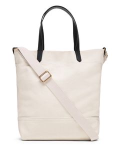 Our sturdy, cotton canvas tote is now available in a smaller size.  Use it as a daytime bag for your wallet and water bottle, or take it to work as a lunch bag.  Sturdy leather handles.  Snap tab closure.  One internal card slot.  Detachable shoulder strap.  Cotton canvas lining.  Height: 12. 5" (31. 75cm) Top width: 13" (33cm) Bottom width: 10" (25. 4cm) Depth: 5" (12. 7cm) Handle drop: 7. 5" (19cm) Everyday Bucket Bag With Double Handle And Canvas Lining, Everyday Double Handle Bucket Bag With Canvas Lining, White Bags With Adjustable Strap For Everyday Use, Daily Use Shoulder Bag With Duck Canvas, Canvas Crossbody Bucket Bag For On-the-go, Trendy Bag With Snap Closure, Everyday Canvas Bucket Bag With Double Handle, Canvas Bucket Bag With Double Handle For Everyday Use, Everyday Duck Canvas Shoulder Bag With Double Handle