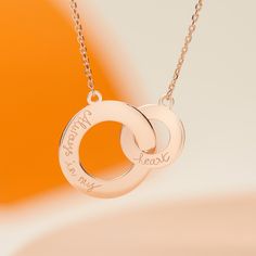 Symbolizing an ever-lasting bond, our Personalized Intertwined Necklace can be hand-engraved with your own special words for the perfect gift.The two circles move freely between each other and as a result, this is one of the few products where we engrave on one side only.18K Champagne Gold Plated, 925 Sterling Silver or 18K Rose Gold Plated18 Gold Plated chainLarge Circle (0.8 wide), small circle (0.5 wide)Hand engraved in our Paris workshopSent with love in a complimentary gift boxAny slight va Intertwined Necklace, French Cursive, Personalised Jewellery, Cursive Handwriting, Christmas Gifts For Wife, Small Circle, Metal Engraving, Jewellery Gift, Circle Necklace