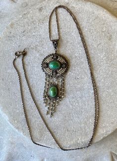 Beautiful Victorian Renaissance Sterling Silver Persian Turquoise Seed Pearl Antique necklace Victorian Jewelry Chain apears to be vintage but newer then pendant chain measures 24 inches around, can be replaced with different chain Vintage Oval Pendant Necklaces With 17 Jewels, Ornate Green Pendant Necklace, Vintage Green Necklace With Chain, Green Ornate Pendant Necklace, Vintage Beaded Chain Pendant Jewelry, Vintage Turquoise Necklace With Oval Pendant, Vintage Beaded Pendant Jewelry, Antique Green Oval Pendant Necklace, Vintage Green Dangle Necklaces