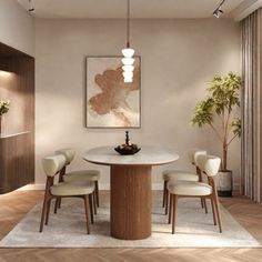 a dining room table with four chairs and a potted plant in the corner next to it