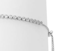 Silver bracelet with simulated diamond stones. This bridal tennis bracelet or dazzling sophistication river of round crystals bracelet made of 925 sterling silver, finished dangling two brightness stones and adjustable round clasp. This celebrity inspired luxury precious stone bridal jewelry truly fabulous and trendy piece is perfect for any occasion. Silver Multi-stone Tennis Bracelet For Formal Occasions, Modern Sterling Silver Diamond Bracelet, Adjustable, Luxury Silver Multi-stone Tennis Bracelet, Luxury Multi-stone Sterling Silver Bracelet, Luxury Multi-stone Cubic Zirconia Tennis Bracelet, Hand Evil Eye, Twisted Bracelet, Evil Eye Earrings, Mesh Bracelet