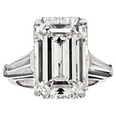 Absolutely stunning and certainly impressive 11 carat diamond engagement ring! This baby is made to stop traffic and leave everyone in awe! Trust our word this is a ring that will leave absolutely everyone speechless! Almost 12 carats (11.89ct to be exact) of pure brilliance this is an emerald cut diamond of an I color and VS1 clarity. Side Diamonds: (2) Baguette Cuts of 0.60cttw. Finger Size: 6.5 (can be resized). Emerald Cut Diamond Engagement Ring, Emerald Cut Diamond Engagement, Emerald Cut Diamond Ring, Emerald Cut Engagement, 3 Stone Engagement Rings, Barbie Model, Fine Jewelery, Modern Engagement Rings, Emerald Cut Diamond