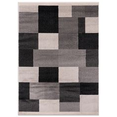 a black and white rug with squares on the bottom, in different shades of grey