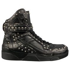 GIVENCHY high top sneakers comes in a black leather featuring a silver studded details, rubber sole, and a lace up style. Very Good Pre-Owned Condition. Light wear. As-is. Marked: 42 Measurements: Length: 11.5 inches Width: 4.25 inches Height: 8 inches Reference: 124998 Category: Sneakers More Details Brand: GIVENCHY Size: 9 Gender: Male Color: Black Pattern: Studded Fabric: Leather Style: High Top Condition: AS IS Age Group: Adult Leather High Tops, Cate Blanchett, Studded Leather, Black Pattern, Silver Studs, Up Styles, Leather Fashion, Emporio Armani, High Top