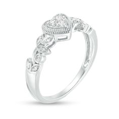 Present her with a romantic token of your affection with this vintage-inspired diamond heart promise ring. Fashioned in sterling silver A heart-shaped composite of round diamonds sparkles in an open frame of intricate milgrain detailing. The sculpted vine-like shank gleams with diamond-touched leaf shapes and bezel-set diamonds. This promise ring captivates with 1/8 ct. t.w. of diamonds. Heirloom Diamond Heart Ring, Anniversary Heart Cut Diamond Heart Ring, Silver Heart Cut Rings With Single Cut Diamonds, Classic Diamond Ring With Accents For Valentine's Day, Classic Heart Shaped Ring With Diamond Accents, Classic Heart-shaped Ring With Diamond Accents, Classic Diamond Heart Ring For Valentine's Day, Diamond Heart Ring With Single Cut Diamonds For Anniversary, Classic Heart-shaped Rings With Diamond Accents