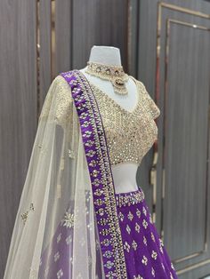 "Be the center of attention in the Rebecca Purple Bridal Lehenga BL-156. With its vibrant rebecca purple hue, this lehenga will make you stand out on your special day. This unique color choice adds a playful twist to traditional bridal wear, making you a fun and stylish bride." Fabric: Raw Silk! WASH CARE INSTRUCTIONS - Please Dry clean only when it is applicable! Ready to Ship! Purple Bridal Lehenga, Stylish Bride, Party Wear Lehenga, Bridal Stores, Beautiful Mirrors, Purple Hues, Bridal Lehenga, Raw Silk, Bridal Wear