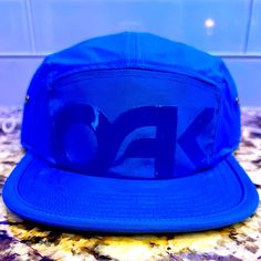 New! Oakley Mark Ii 5 Panel Hat - Custom Fit - Flat Brim - Color Blue Ozone Blue Flat Bill Hats For Spring, Blue Snapback Hat With Flat Brim For Spring, Blue Flat-brim Snapback Hat For Spring, Blue Flat Brim Snapback Hat For Spring, Blue Short Brim Snapback Hat For Spring, Blue Adjustable Snapback Hat For Spring, Blue Snapback Hat With Short Brim For Summer, Blue Summer Snapback Hat With Short Brim, Blue 5-panel Summer Hats