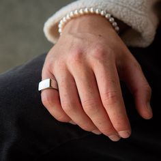 ANGULAR SIGNET RING IN SILVER PLATED STAINLESS STEEL Water/sweat/heat resistant (no green skin) Comes in eco-friendly packaging Weight approx 9g We make this ring following our sustainable ethos. It's crafted from recycled stainless steel, and it can be fully recycled again to make new products in the future. Minimalist White Tarnish Resistant Jewelry, White Minimalist Tarnish-resistant Jewelry, Minimalist White Tarnish-resistant Jewelry, Everyday White Tarnish Resistant Jewelry, Everyday White Tarnish-resistant Jewelry, Adjustable White Gold Signet Ring For Everyday, Everyday White Ring Jewelry, White Everyday Ring, Minimalist Adjustable White Gold Signet Ring